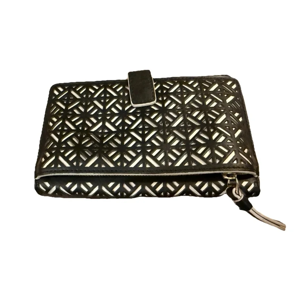 Tory Burch Fret-T wallet Wrislet on a Black & White Lace Cut Out Zip Around